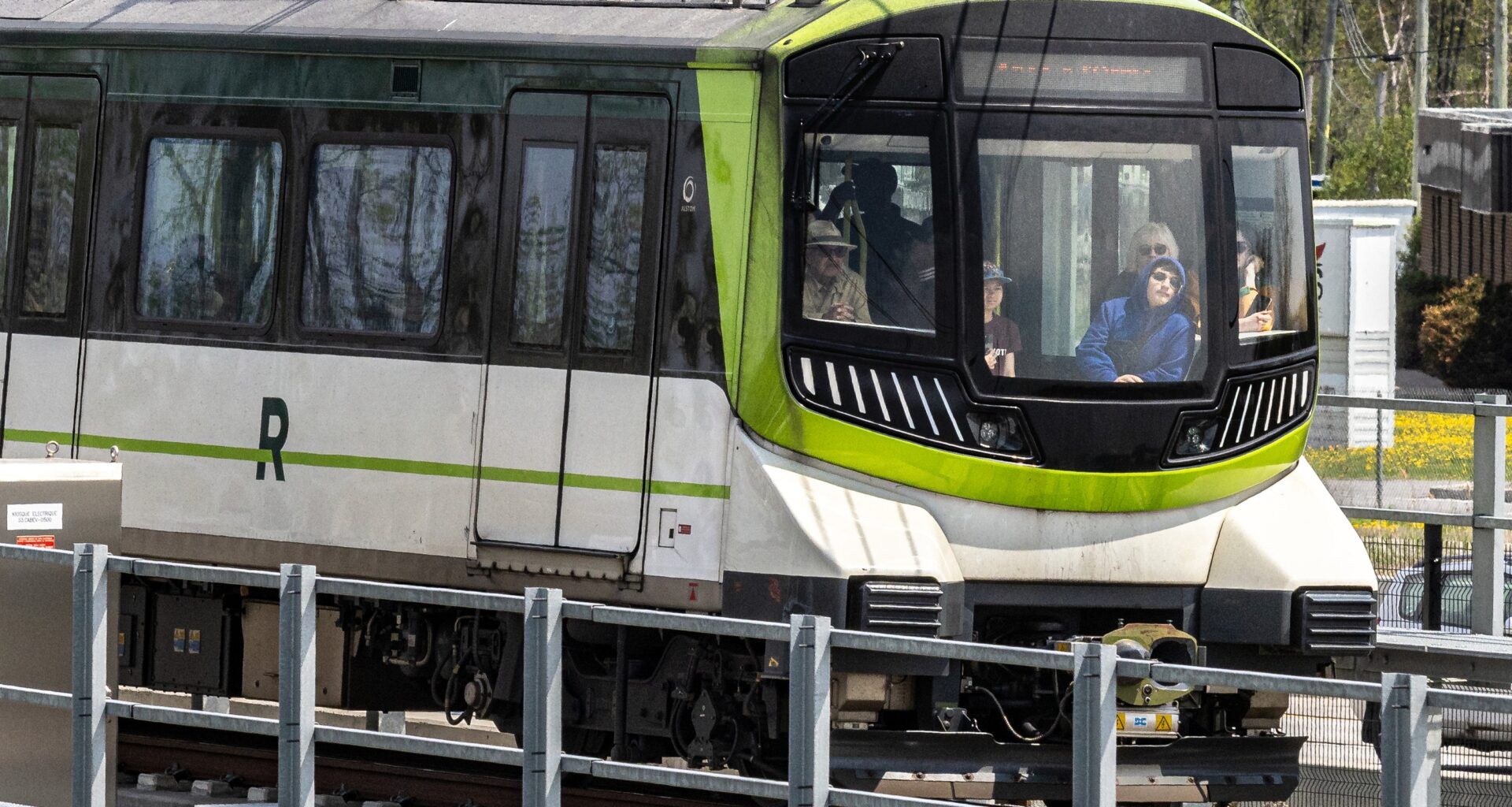 A REM train pulls into the Anse-à-l'Orme station in Ste-Anne-de-Bellevue on Monday.