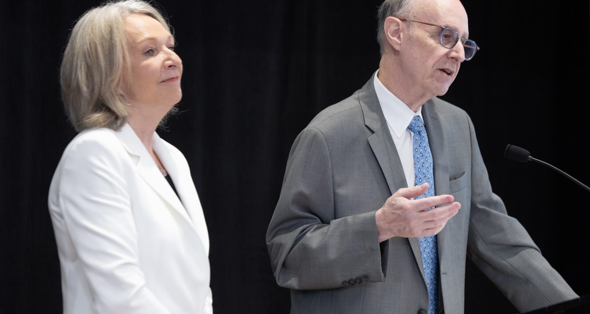 Two people on stage.