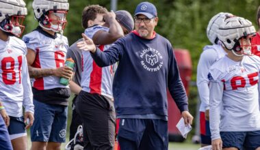 Offensive-co-ordinator Anthony Calvillo speaks to his players during training camp.