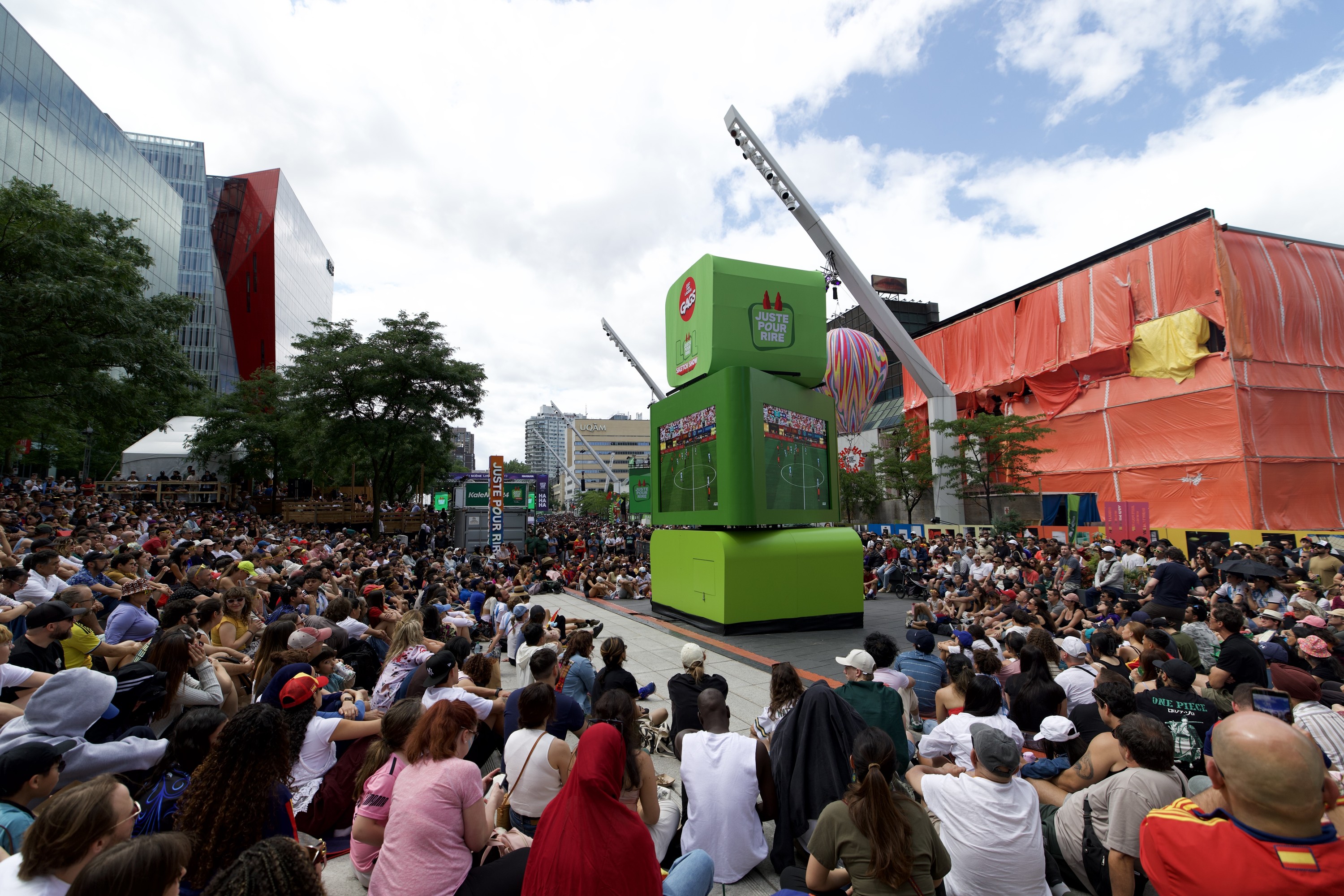 Fans watch an outdoor screening of the FIFA World Cup final between Spain and Argentina, at Place des Festivals in Montreal