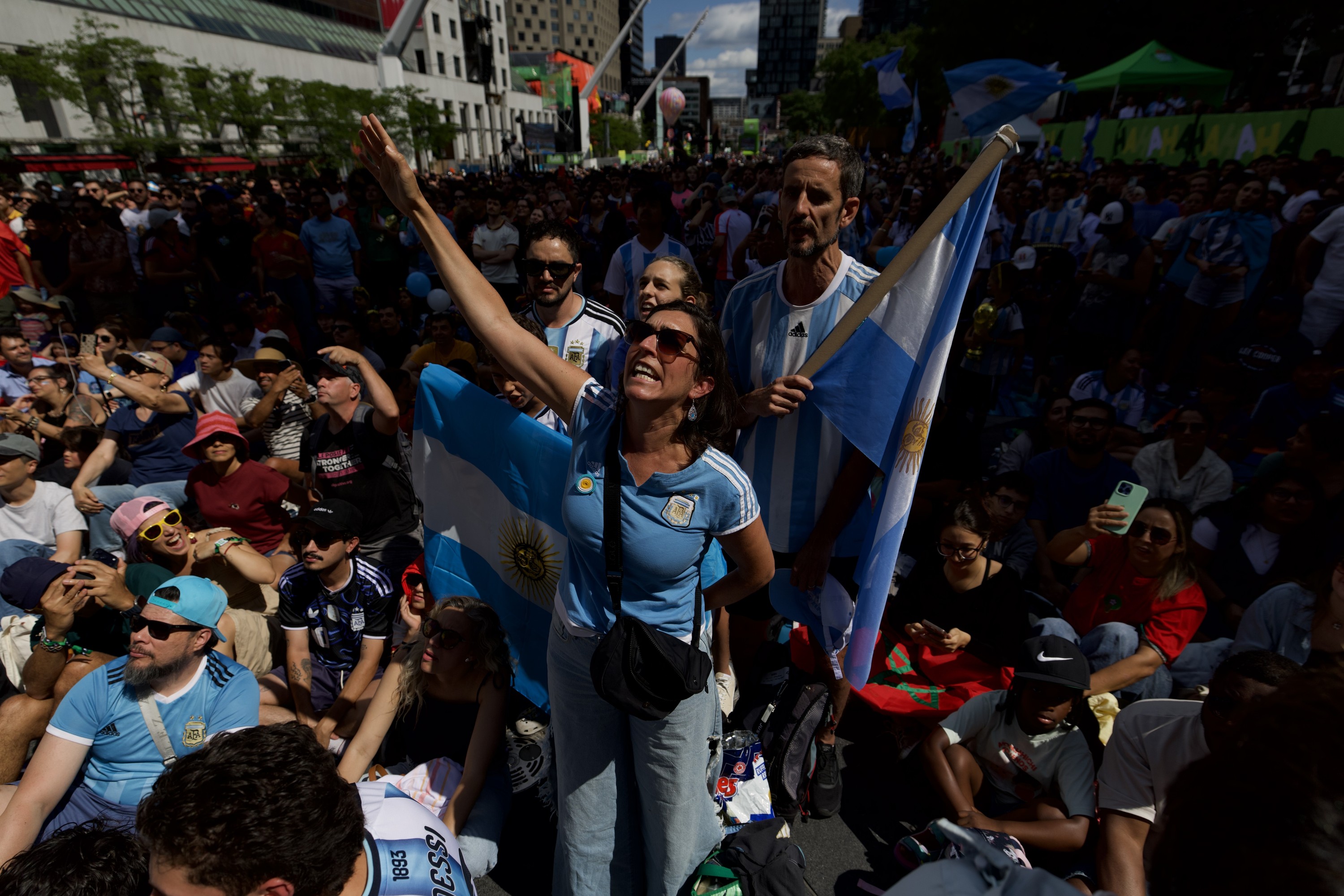 Fans watch an outdoor screening of the FIFA World Cup final between Spain and Argentina, at Place des Festivals in Montreal