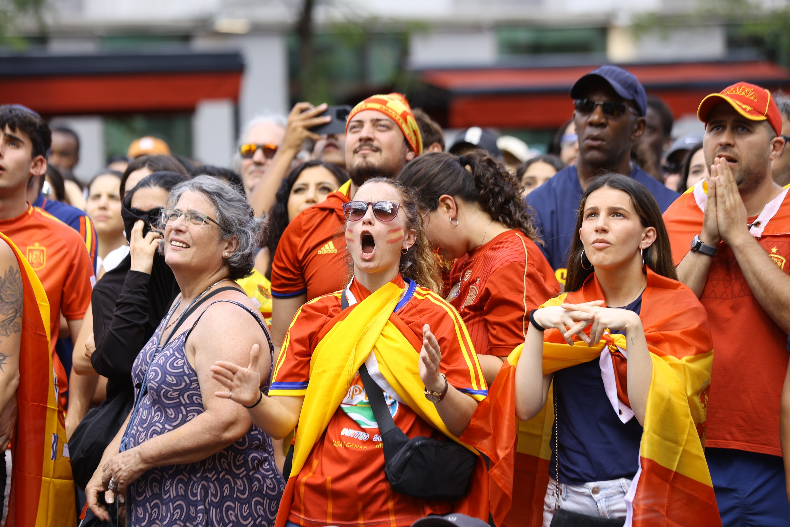 Fans watch an outdoor screening of the FIFA World Cup final between Spain and Argentina, at Place des Festivals in Montreal