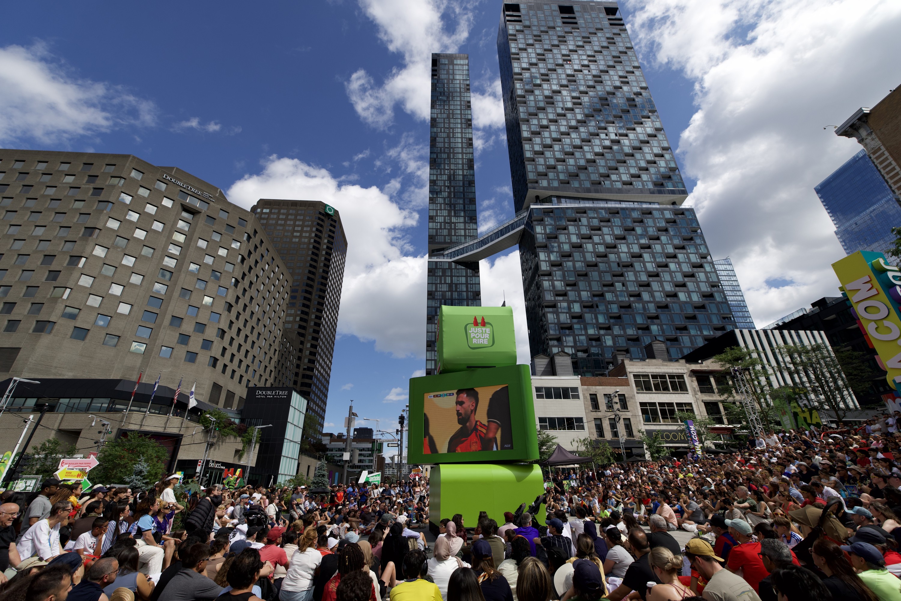 Fans watch an outdoor screening of the FIFA World Cup final between Spain and Argentina, at Place des Festivals in Montreal