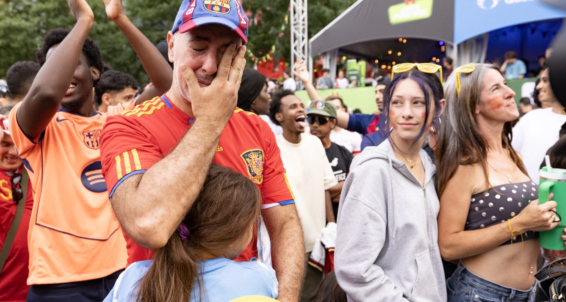 Fans watch an outdoor screening of the FIFA World Cup final between Spain and Argentina, at Place des Festivals in Montreal