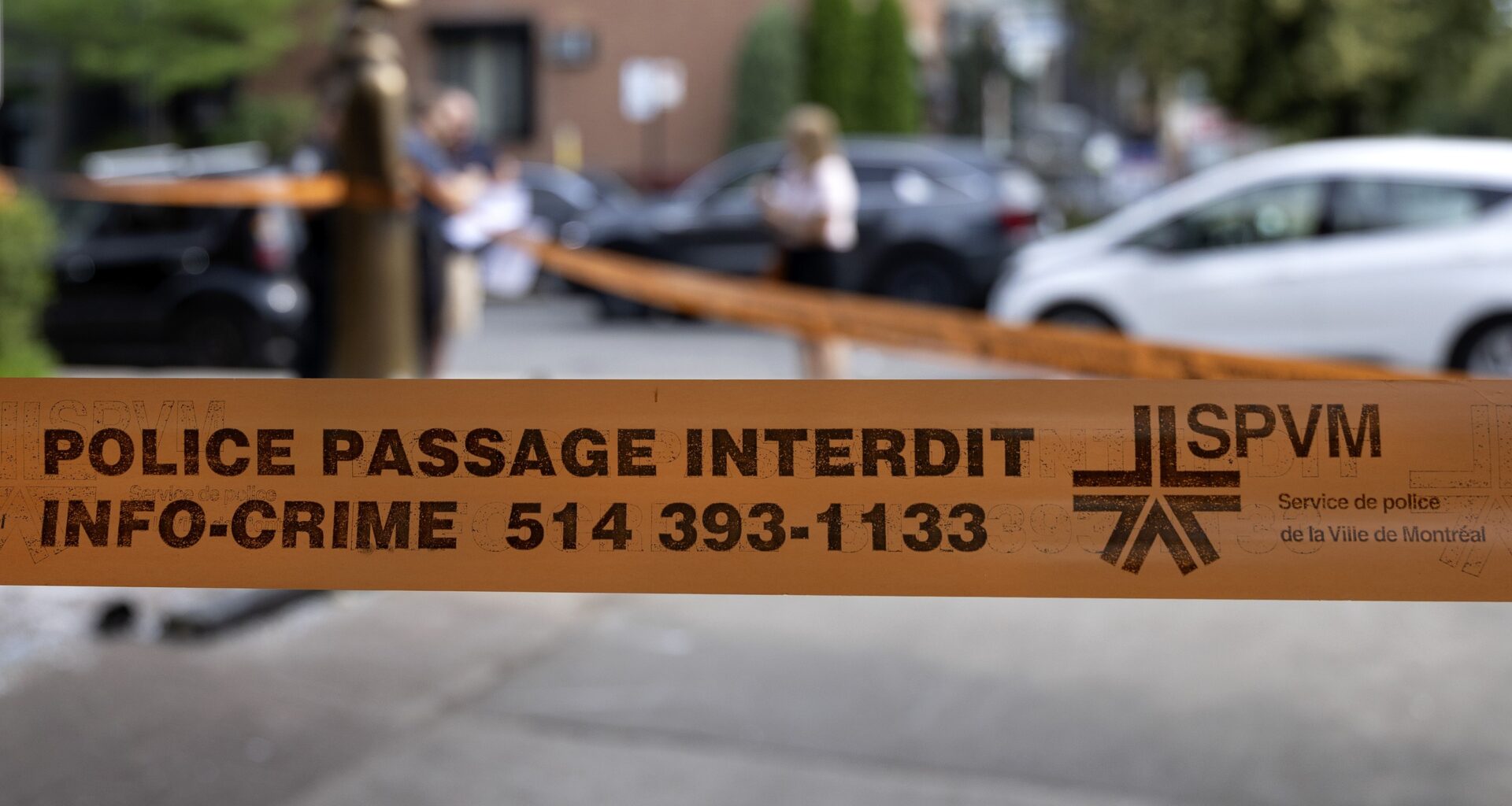 Montreal police tape at the scene off a crime.