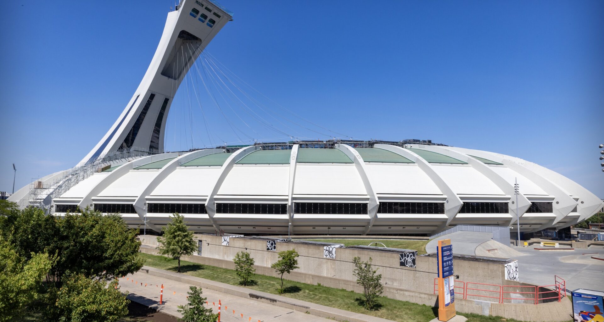 Montreal's Olympic Stadium is seen from the side on a sunny day