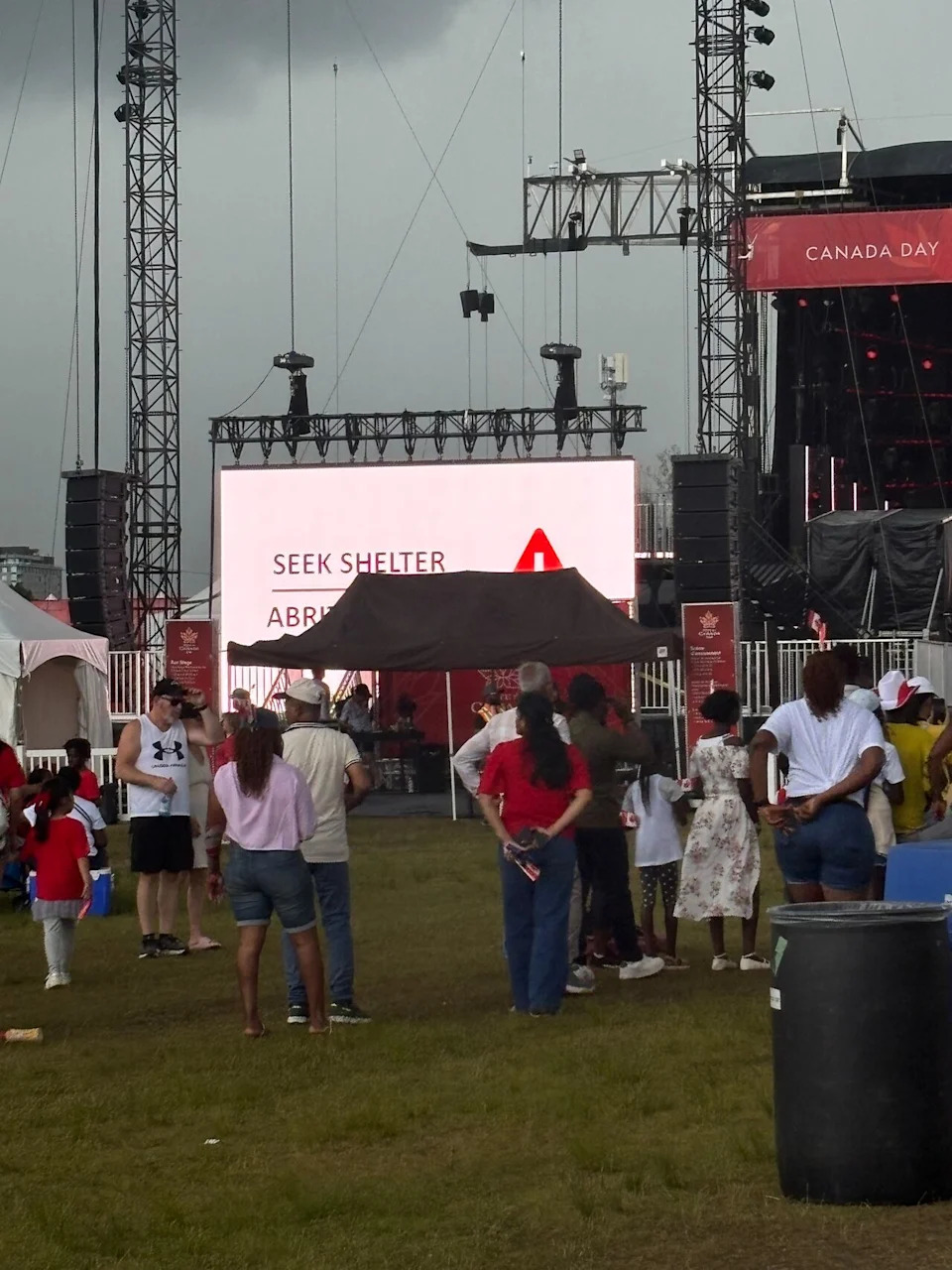 A billboard at LeBreton Flats Park tells the public to seek shelter on July 1, 2026.