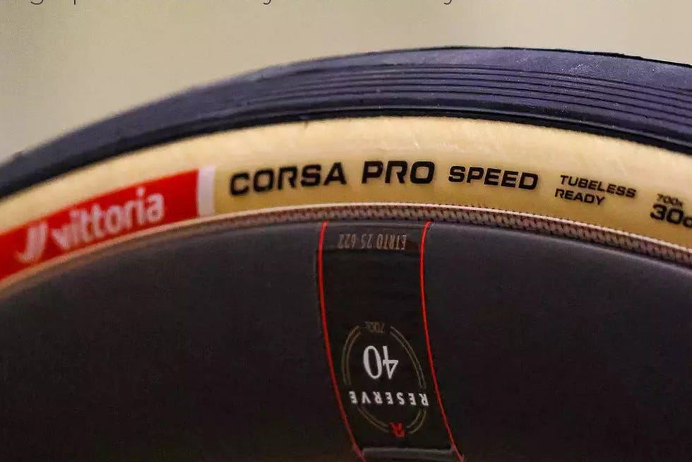Close-up of a Vittoria Corsa Pro Speed tire showing the size designation and tubeless ready features. Close-up of a Vittoria Corsa Pro Speed tire showing the size designation and tubeless ready features.