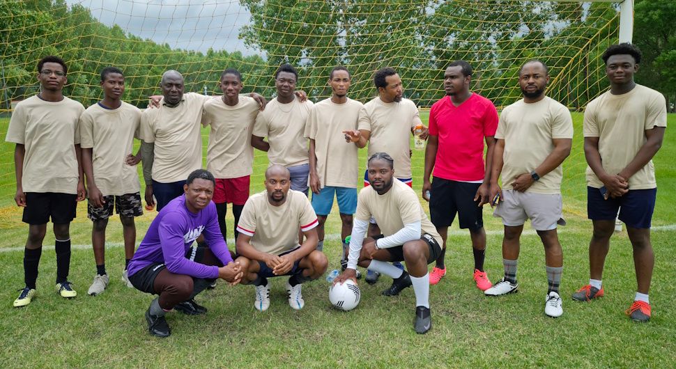 Members of the Nigerian community pose for a team photo before competing in the All Nations Soccer Day tournament. Submitted Photo/ Abosede Jogunosinmi
