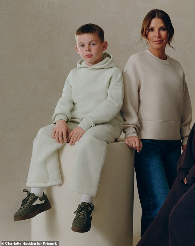 The WAG, 40, shared her delight, calling the photoshoot with her youngest child a 'special moment'.