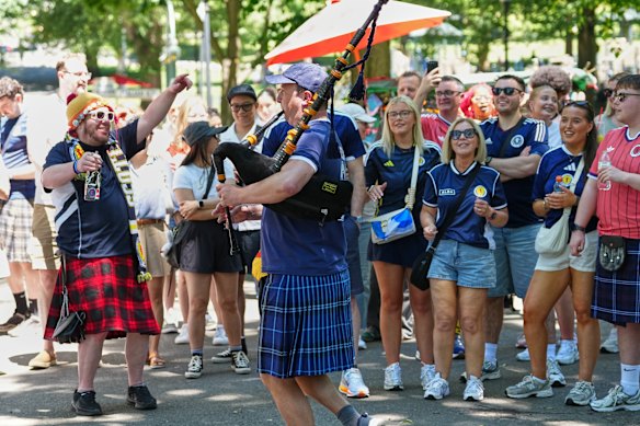 Scottish fans celebrate at a park in central Boston.