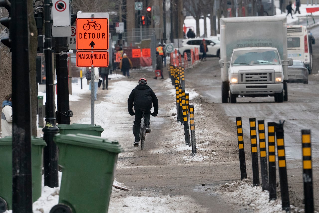 cylicist biking in the winter