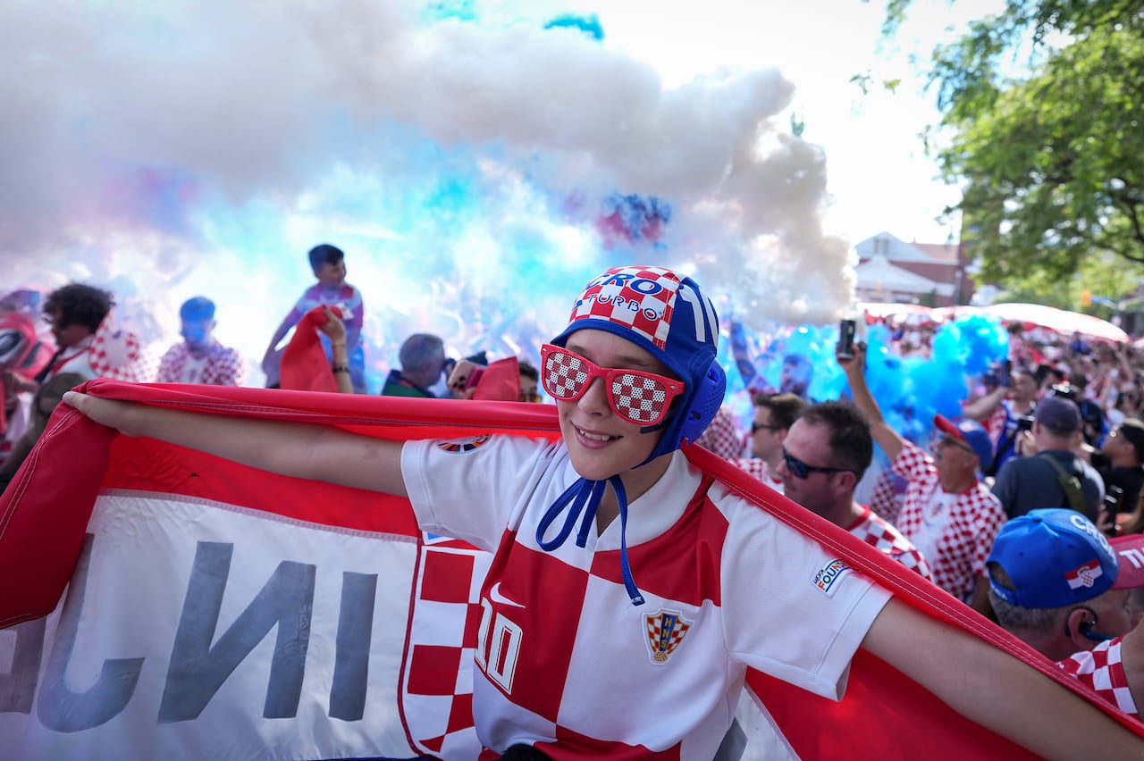 Croatian fan in jersey and with a flag