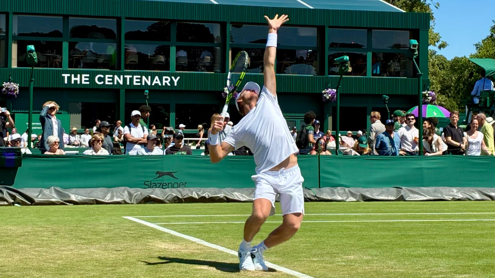 Duke's Pedro Rodenas, wearing a white hat, blue shirt and black shorts, prepares to hit a shot during Duke's second round ACC Championship match against Miami at the Cary Tennis Park on April 16, 2026.