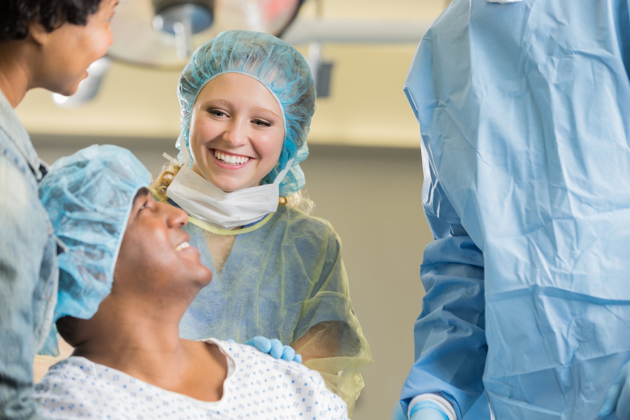 Nurses prepare a patient for surgery.