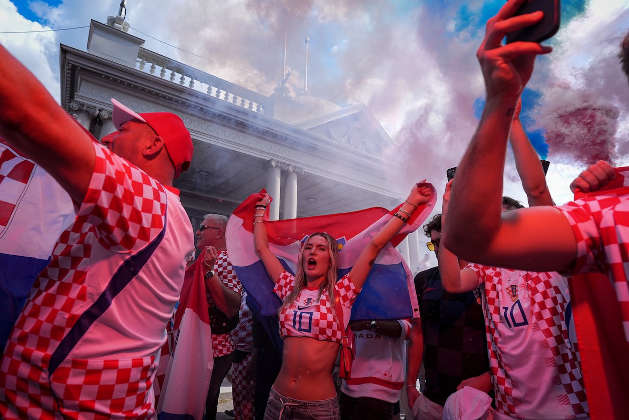 Croatia fans rally outside Toronto Stadium ahead of a FIFA World Cup group stage match between Croatia and Panama on a sunny summer day