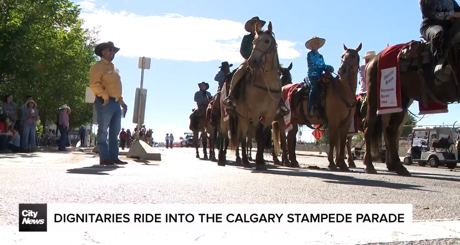 Dignitaries ride into the Calgary Stampede Parade