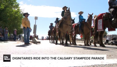 Dignitaries ride into the Calgary Stampede Parade
