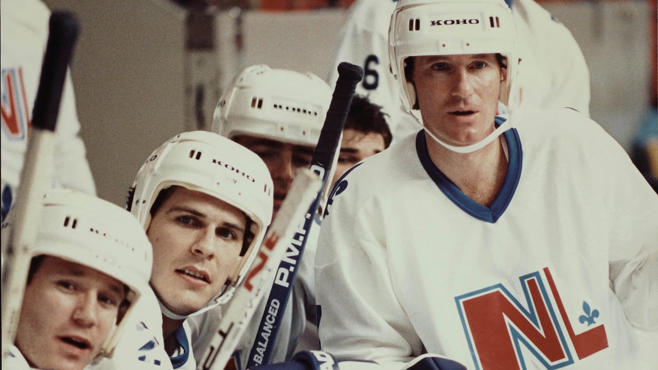 A shot from a Quebec TV show featuring three hockey players