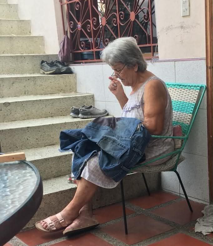 A woman sewing.