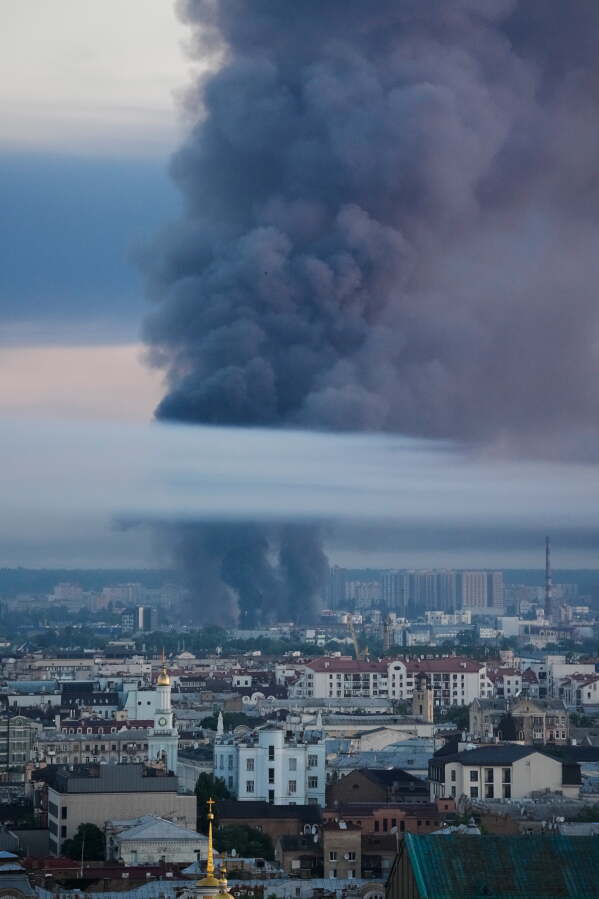 Smoke rises over the city center after a Russian attack on Kyiv, Ukraine, Thursday, July 2, 2026. (AP Photo/Efrem Lukatsky)