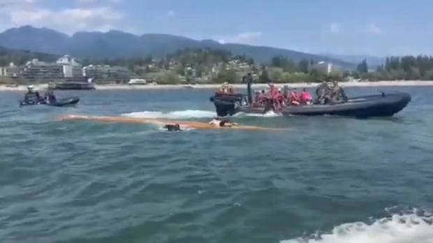 Mounties rescue 11, including several youths, from capsized canoe near West Vancouver