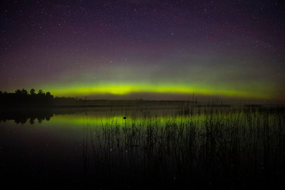 Space weather forecast are for up to a G1-class geomagnetic storm Friday, July 10, through Saturday, July 11, for northern states, with the following night up to G2. (Photo by Alex Kormann/Star Tribune via Getty Images). Image shows Northern Lights over Minnesota skies.