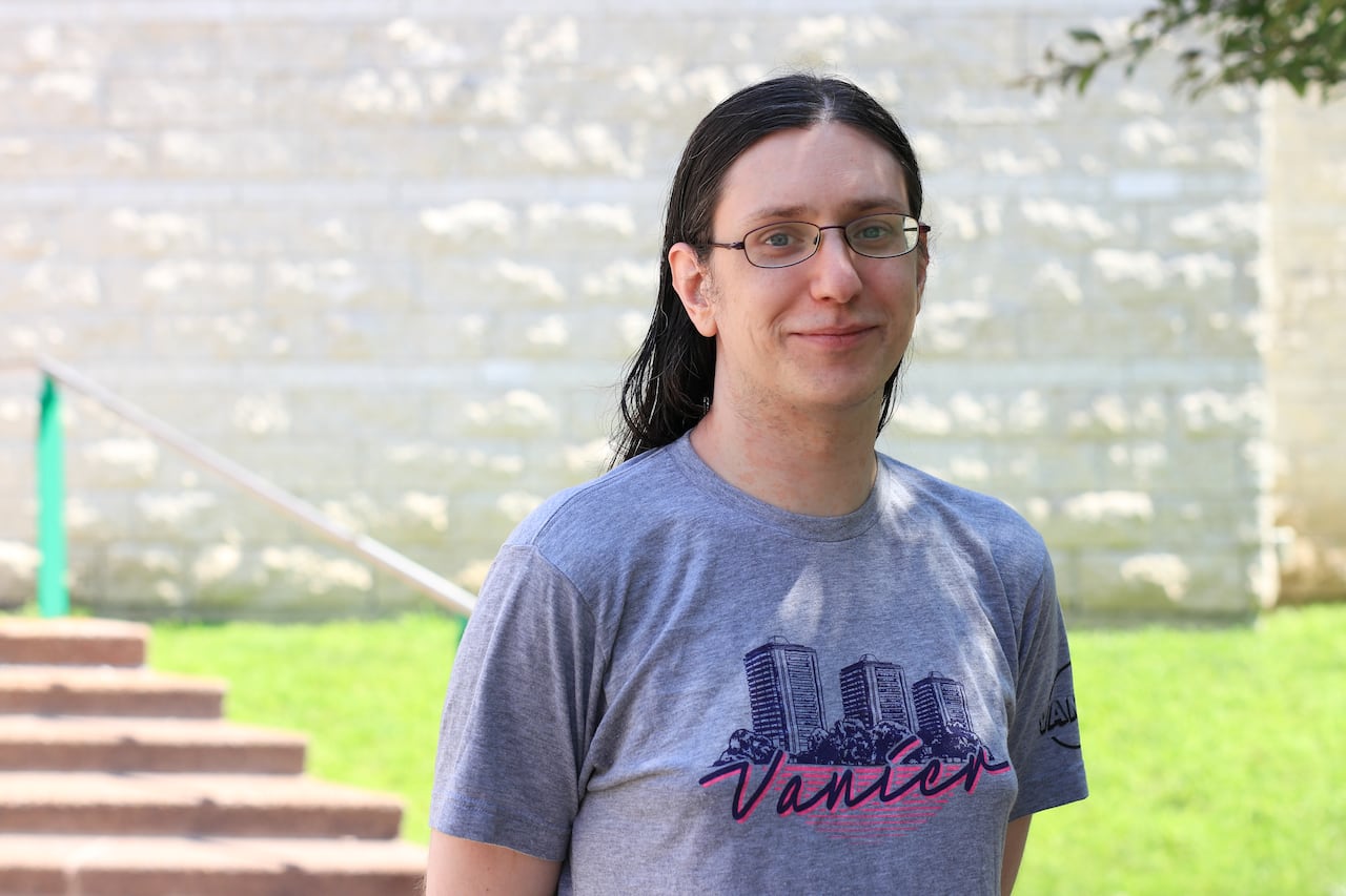 A woman wearing a shirt that says Vanier