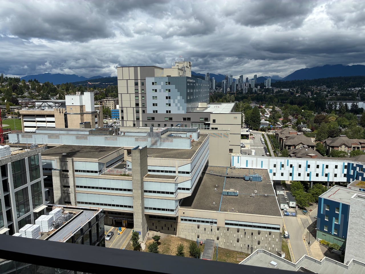 A view from high up of multiple large buildings.