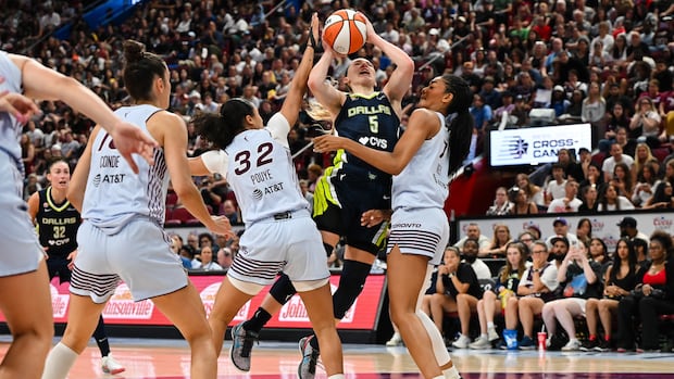 WNBA regular-season record crowd of 20,996 watches Wings beat Tempo in Montreal