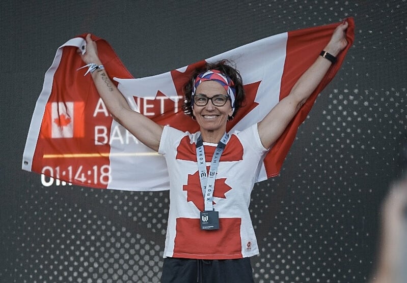 woman holds canada flag