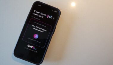 A phone displaying the opening screen of Oops Social