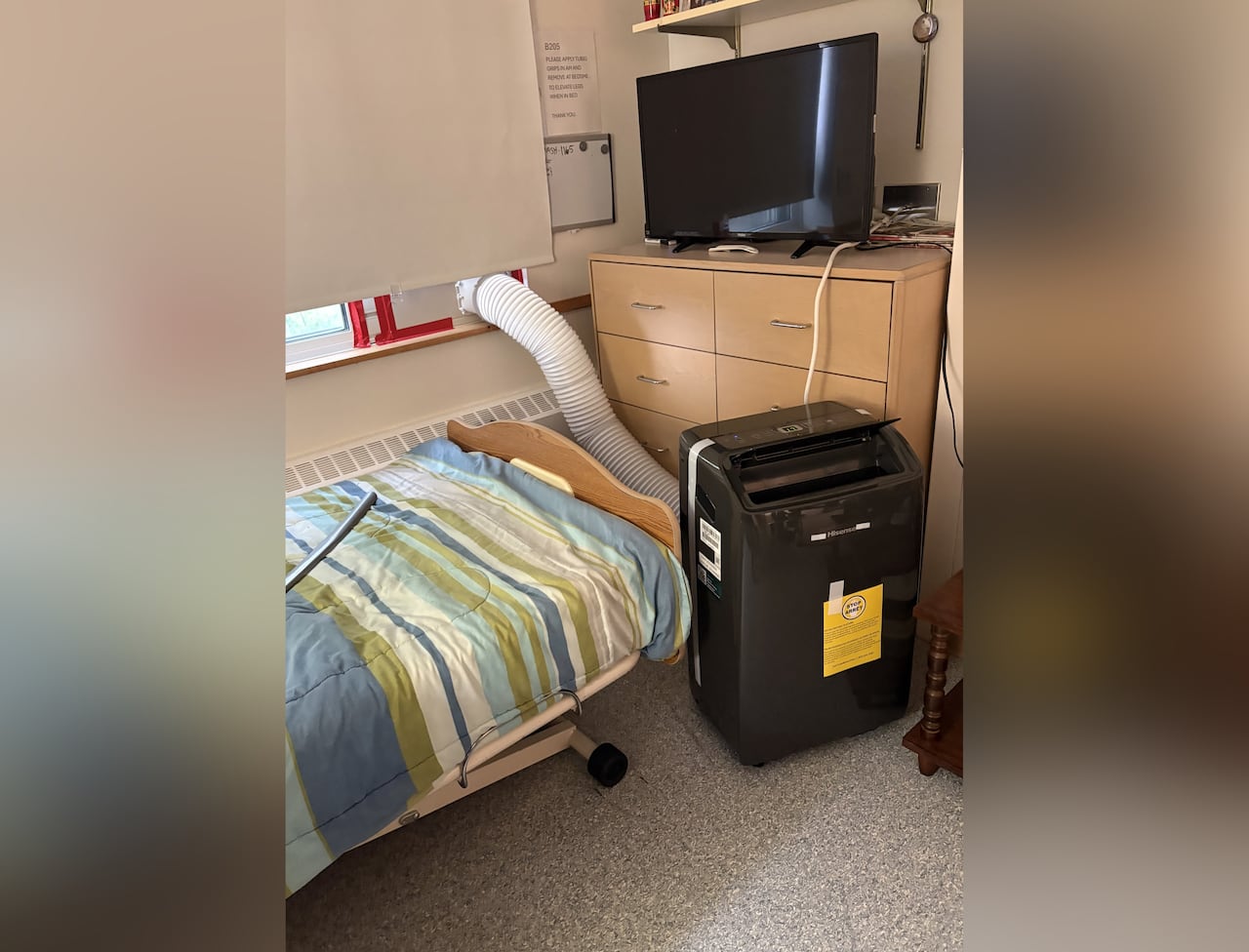 A small air conditioning unit in a seniors unit