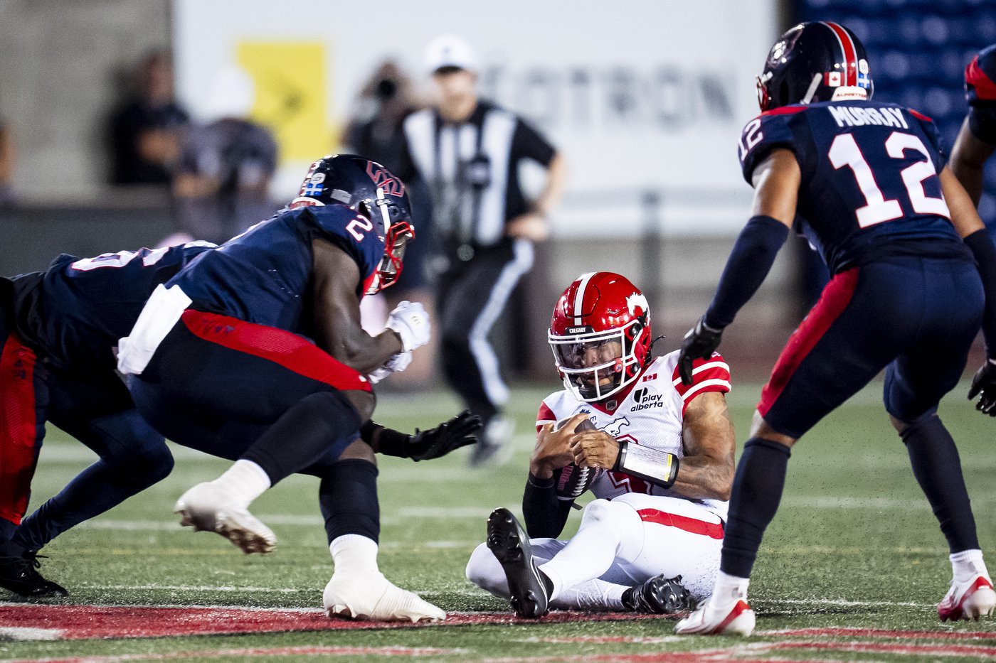 CFL fines Alouettes’ Micah Awe for high hit on Stampeders QB Vernon Adams Jr. | NanaimoNewsNOW