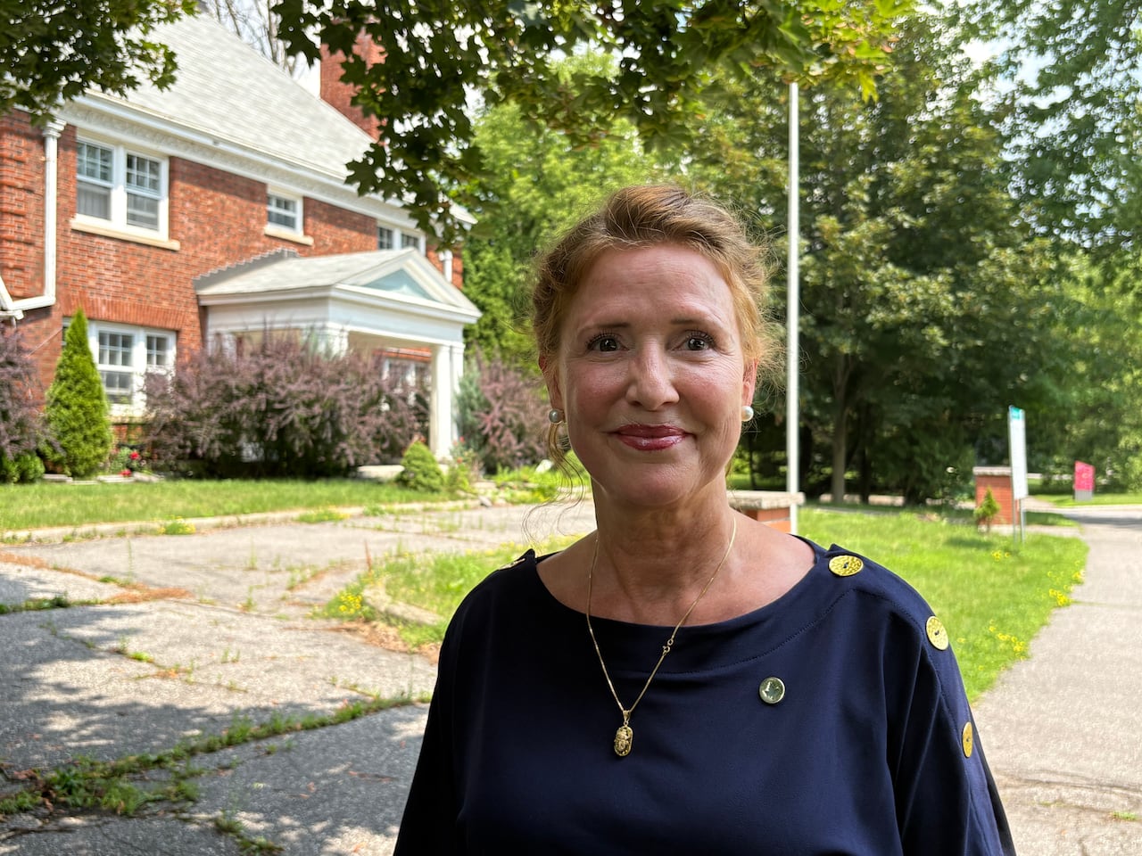 a woman in a blue shirt
