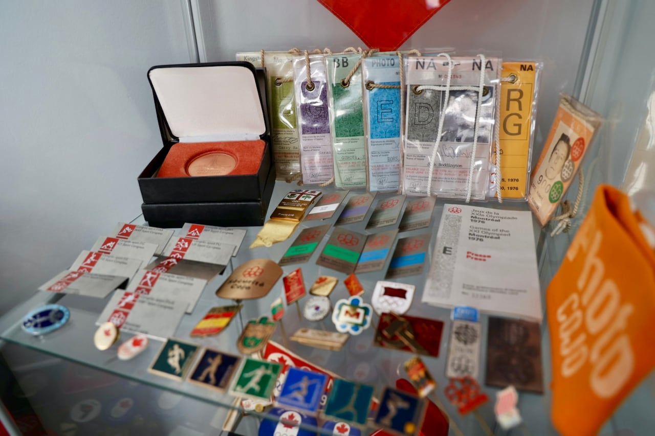 Pins and badges that were worn during the games