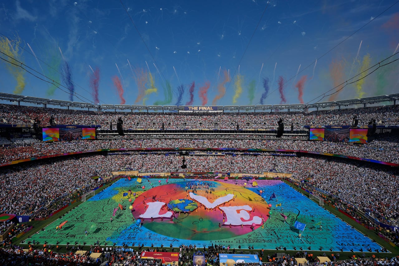 A colourful display of the word "love" in a stadium.