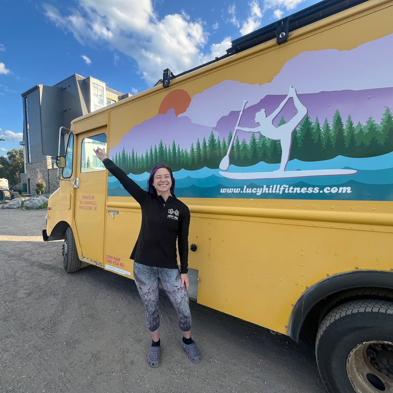 Lucy Hill stands outside her home on wheels. She says she has invested significant time and money to make it livable year-round, adding a toilet, sink, air conditioning and heat.