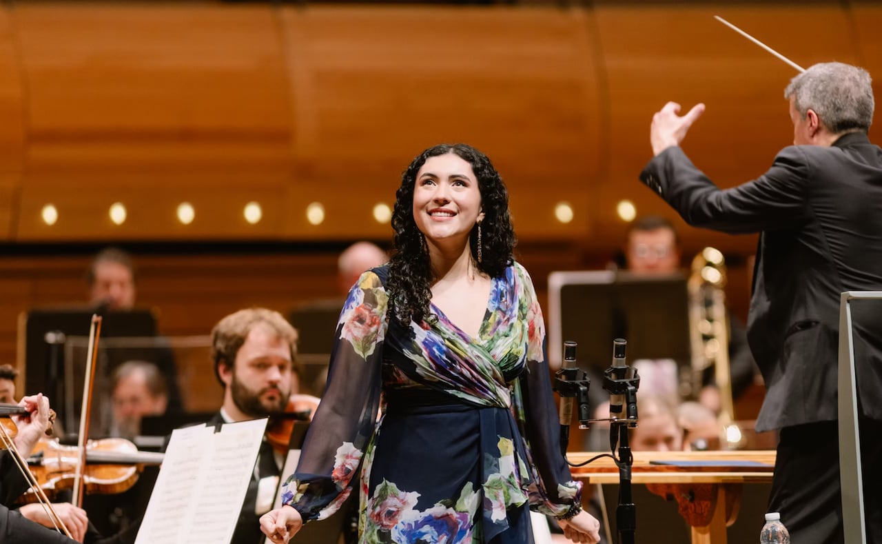 Soprano Gabrielle Turgeon is pictured onstage with the Montreal Symphony Orchestra.