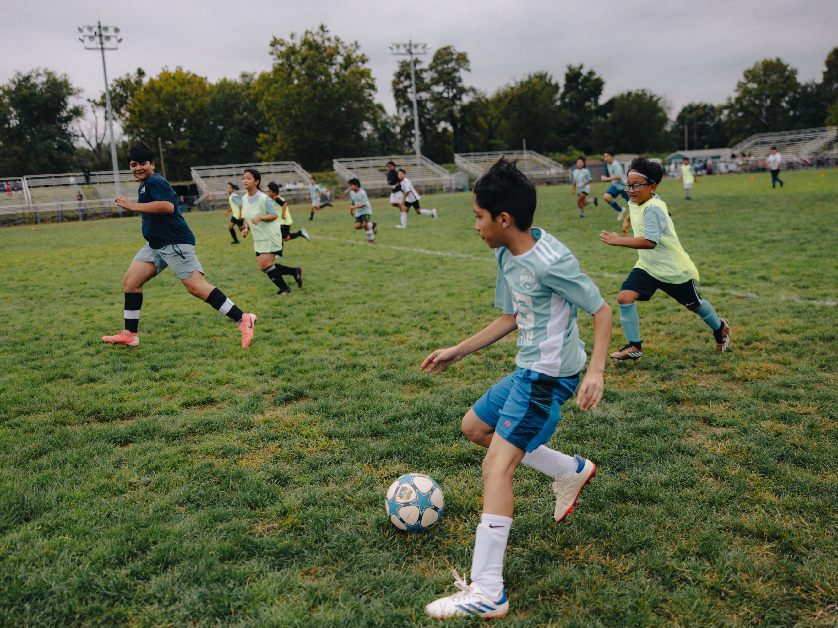 Children from ARU's Soccer for Success program play in a scrimmage during the Kalu Singh Tamang Memorial Championship in Harrisburg, Pa., on Sept. 21, 2025.