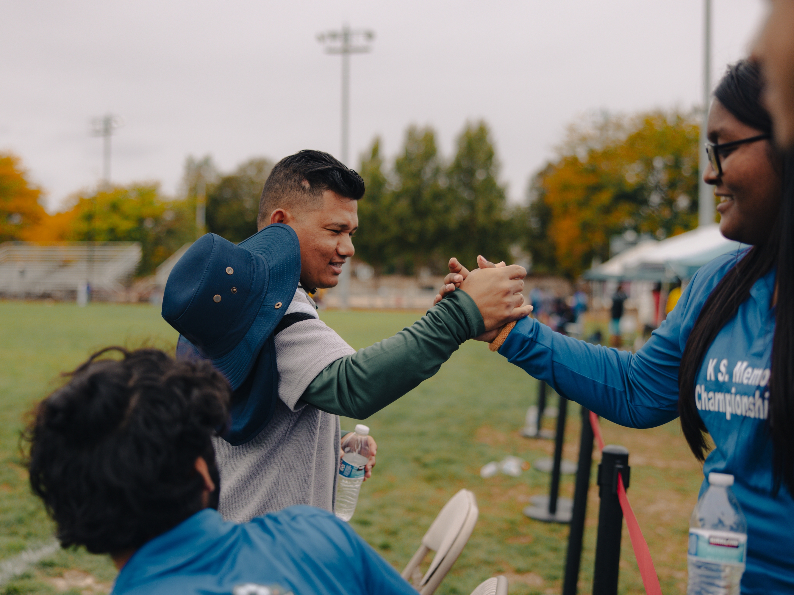 Robin Gurung greets volunteers who are helping run ARU's Kalu Singh Tamang Memorial Championship in Harrisburg, Pa., on Sept. 21, 2025.