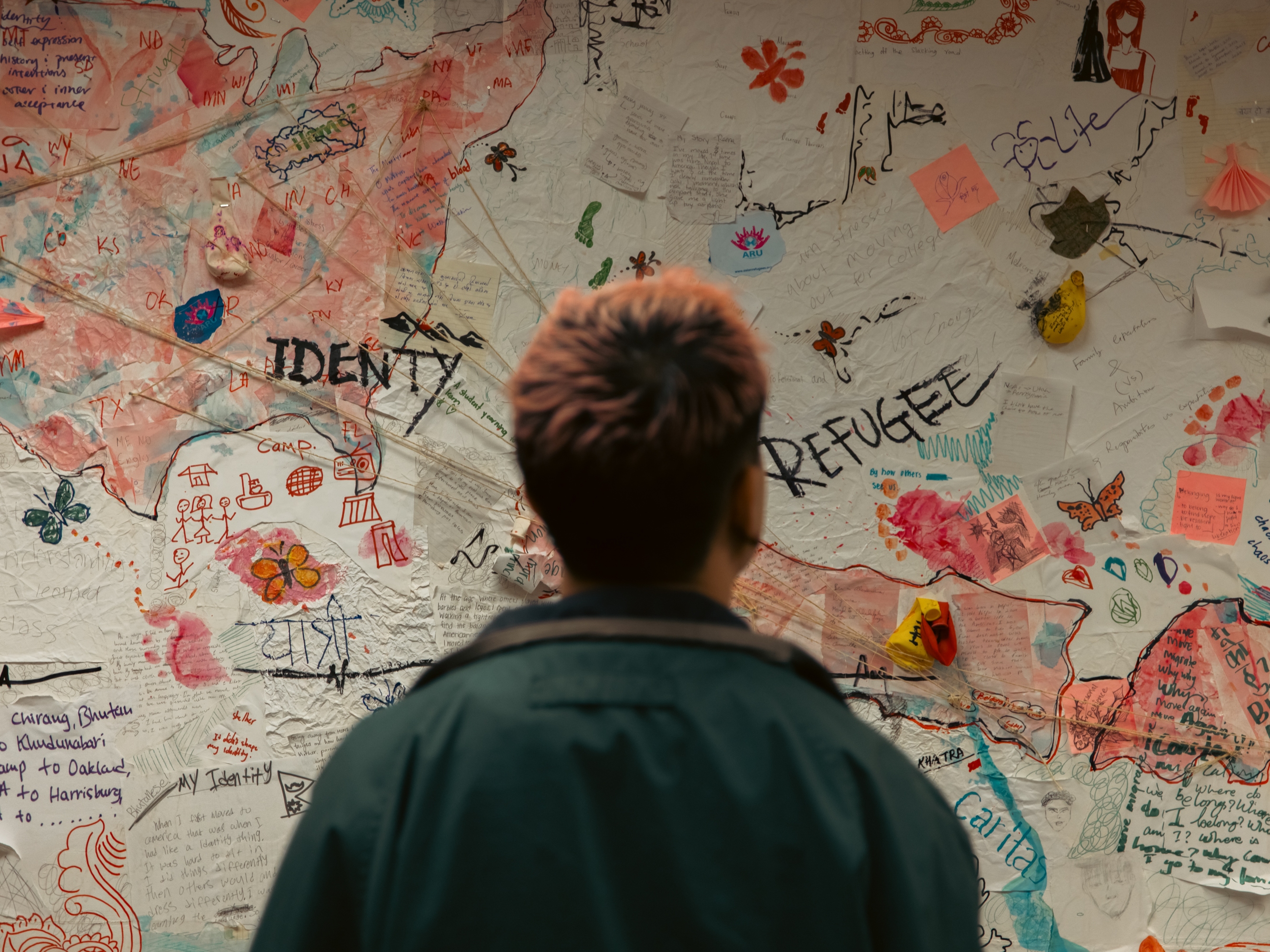At the Asian Refugees United office in Harrisburg, Pa., a map built by staff and youth members shows the different identities of their community.