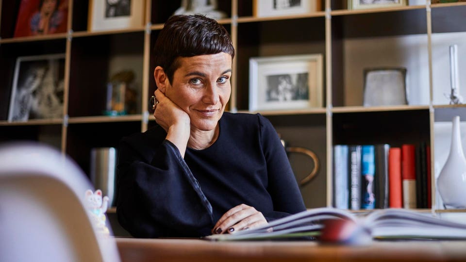 Portrait of smiling short-haired woman at home