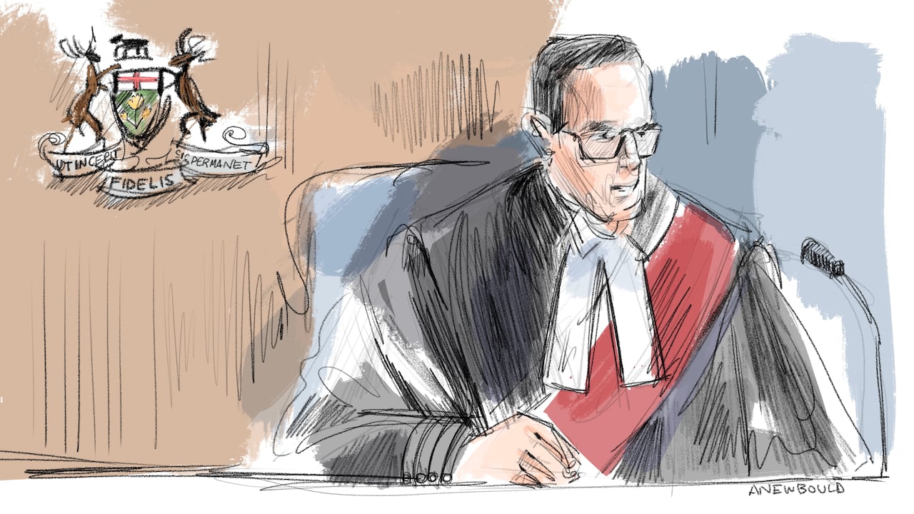 Judge sitting in a courtroom.