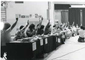 People vote in a black and white photograph