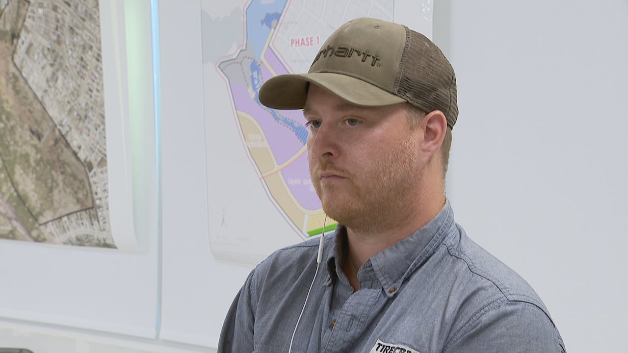 A man wearing a ball cap