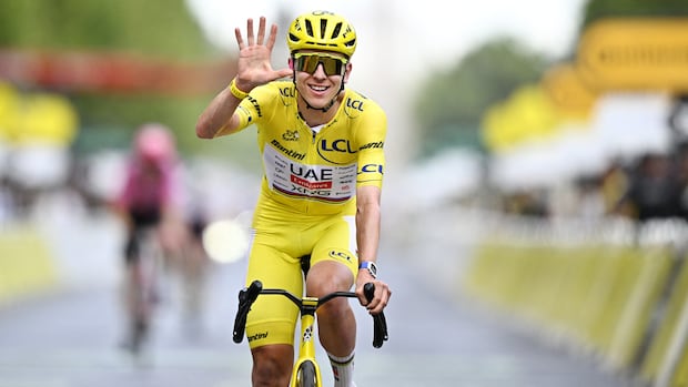 Slovenia's Tadej Pogacar wins record-tying 5th Tour de France title