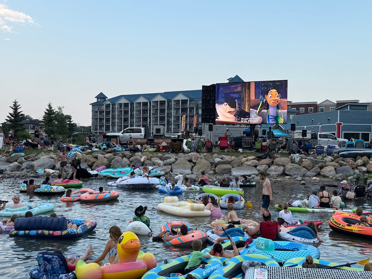 People floating in Sylvan Lake while watching Shark Tale, the kid-friendly movie that was screened before Jaws.