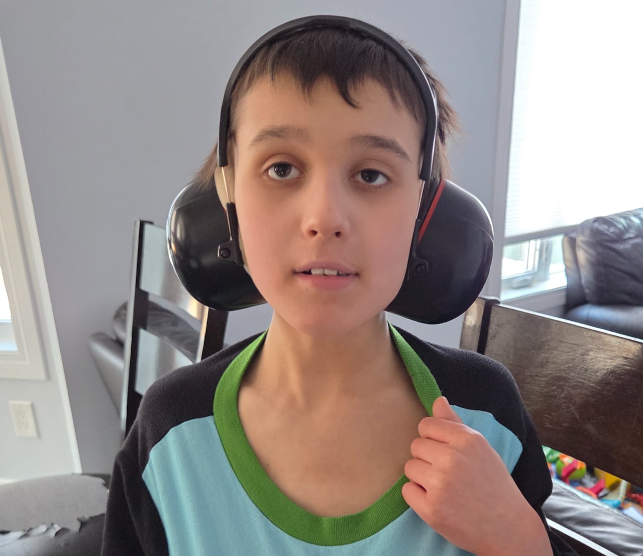 A boy wearing headphones.