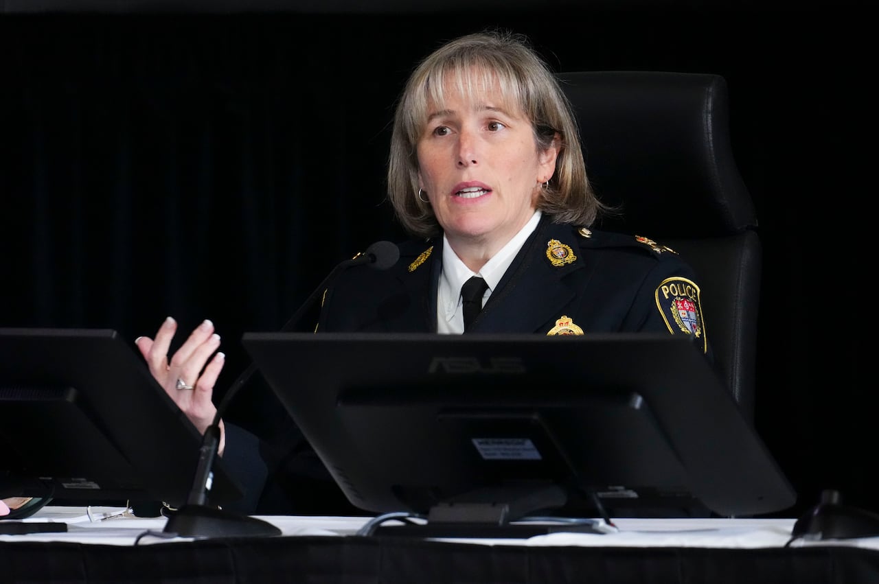 A woman in a police uniform.